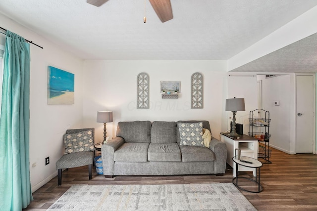2422 Briers Dr Unit D, Columbus, OH 43209 - living area with wood finished floors, a ceiling fan, baseboards, and a textured ceiling