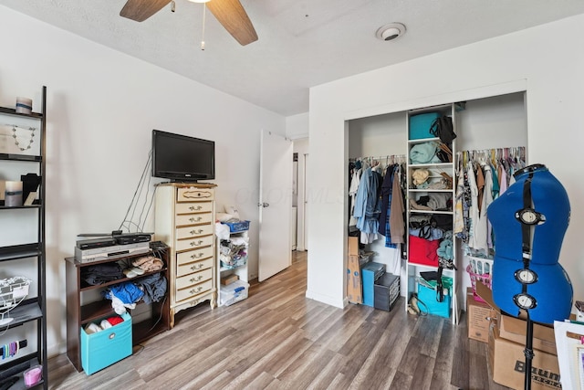 2422 Briers Dr Unit D, Columbus, OH 43209 - bedroom with wood finished floors, a closet, and ceiling fan