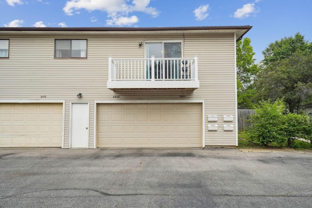 2422 Briers Dr Unit D, Columbus, OH 43209 - view of front of house with a balcony and a garage