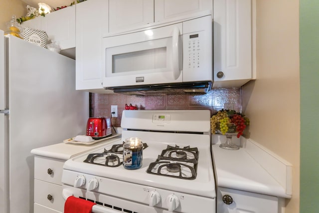 4655 Athalia Dr Unit 20B, Columbus, OH 43228 - kitchen featuring white appliances, backsplash, light countertops, and white cabinetry