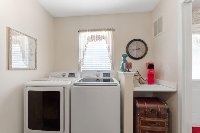 4655 Athalia Dr Unit 20B, Columbus, OH 43228 - washroom featuring washing machine and clothes dryer