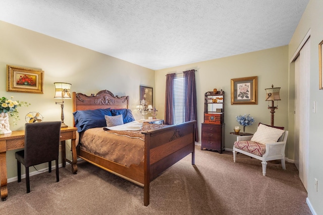 4655 Athalia Dr Unit 20B, Columbus, OH 43228 - carpeted bedroom featuring a closet, a textured ceiling, and baseboards