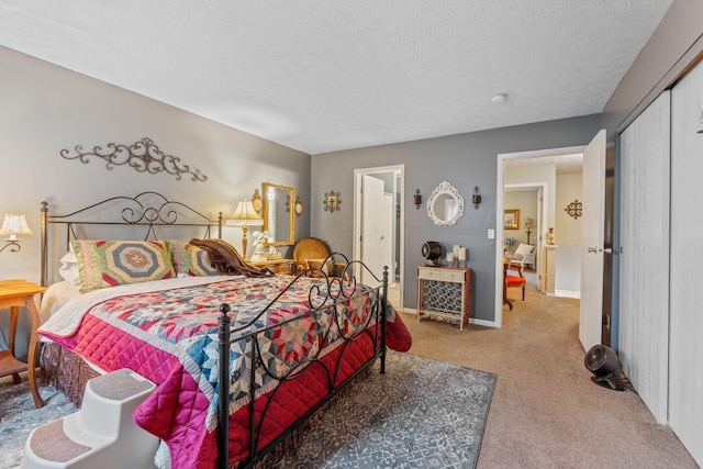4655 Athalia Dr Unit 20B, Columbus, OH 43228 - bedroom featuring carpet floors, a textured ceiling, and a closet