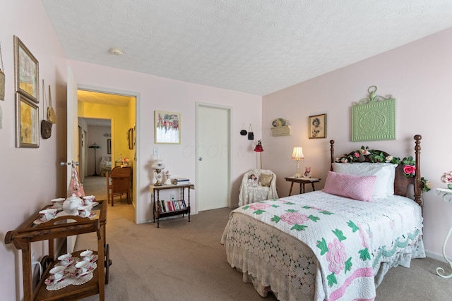 4714 Athalia Dr Unit 26B, Columbus, OH 43228 - bedroom featuring carpet flooring and a textured ceiling