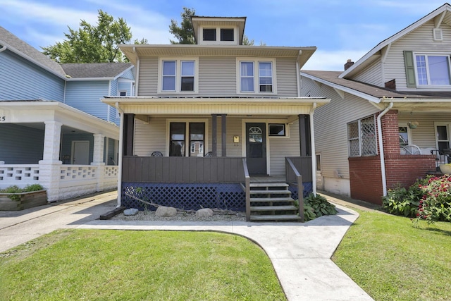 421 E Main St, Newark, OH 43055 - american foursquare style home with covered porch and a front lawn