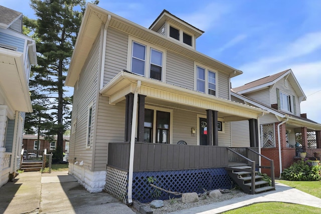 421 E Main St, Newark, OH 43055 - american foursquare style home featuring a porch