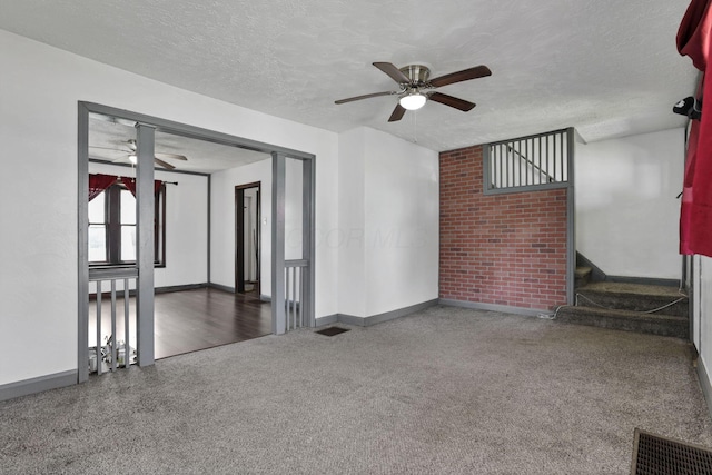 421 E Main St, Newark, OH 43055 - spare room with ceiling fan, carpet, a textured ceiling, and baseboards