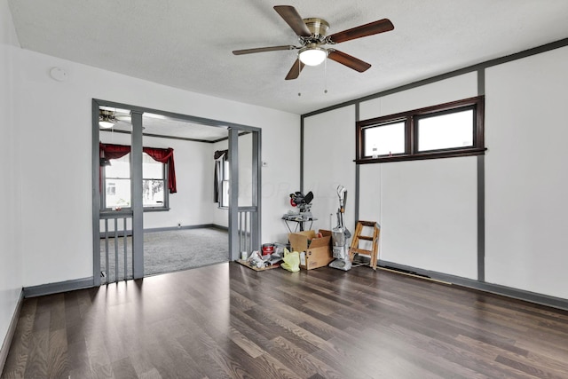 421 E Main St, Newark, OH 43055 - empty room with a ceiling fan, wood finished floors, baseboards, and a textured ceiling