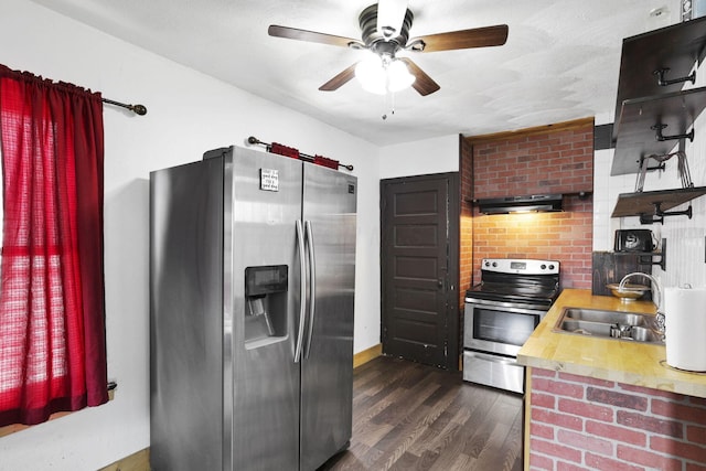 421 E Main St, Newark, OH 43055 - kitchen featuring appliances with stainless steel finishes, a sink, dark wood finished floors, under cabinet range hood, and light countertops