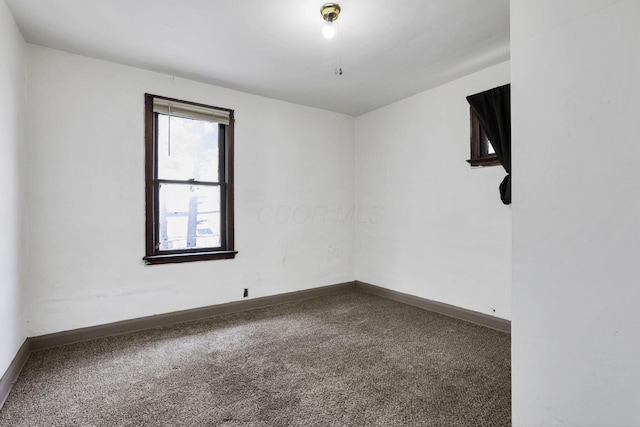 421 E Main St, Newark, OH 43055 - unfurnished room with carpet floors and baseboards