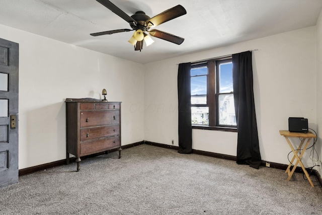 421 E Main St, Newark, OH 43055 - bedroom with carpet flooring, baseboards, and a ceiling fan