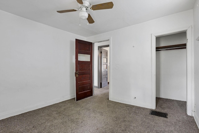 421 E Main St, Newark, OH 43055 - unfurnished bedroom featuring carpet floors, a closet, a ceiling fan, and baseboards