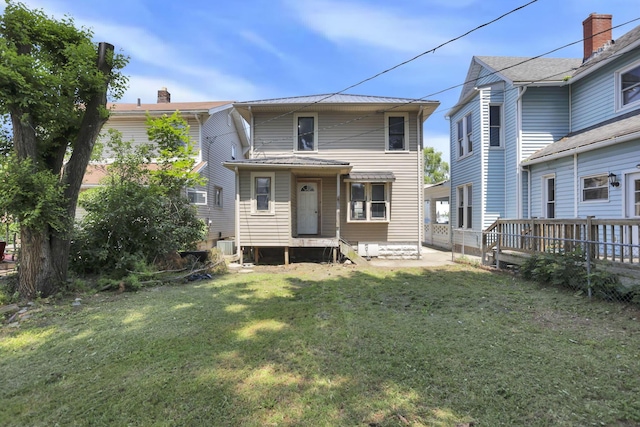 421 E Main St, Newark, OH 43055 - back of house with a lawn and central AC unit
