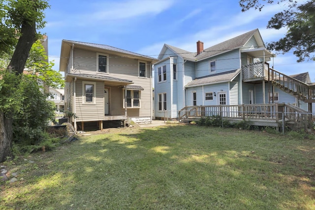 421 E Main St, Newark, OH 43055 - rear view of property with a lawn and a deck