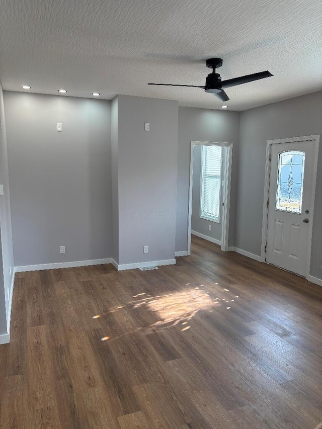 418 Clinton St, Circleville, OH 43113 - entrance foyer featuring ceiling fan, baseboards, wood finished floors, and a textured ceiling