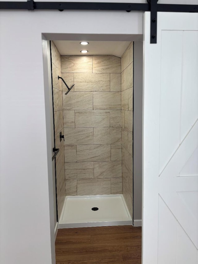 418 Clinton St, Circleville, OH 43113 - full bathroom with a tile shower and wood finished floors