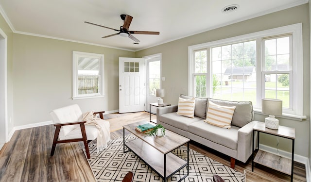 2474 Mecca Rd, Columbus, OH 43224 - living area featuring ornamental molding, a ceiling fan, baseboards, and wood finished floors