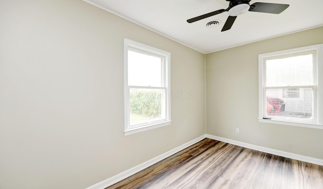 2474 Mecca Rd, Columbus, OH 43224 - spare room featuring baseboards, wood finished floors, and ceiling fan