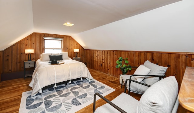 2474 Mecca Rd, Columbus, OH 43224 - bedroom featuring lofted ceiling, wooden walls, and wood finished floors