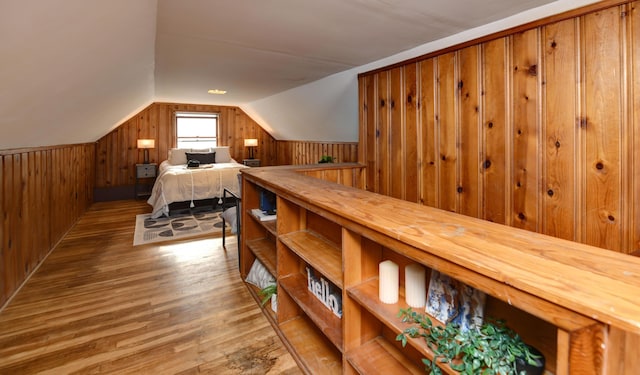 2474 Mecca Rd, Columbus, OH 43224 - bedroom featuring lofted ceiling, wood finished floors, and wood walls