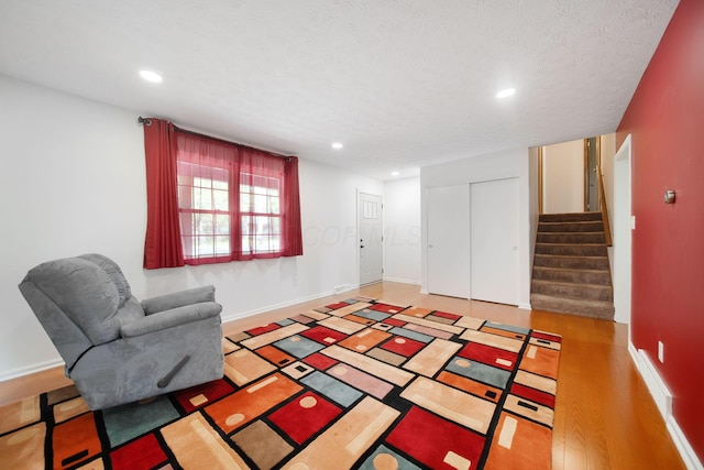 5770 Linworth Rd, Columbus, OH 43235 - living area featuring recessed lighting, stairway, and baseboards