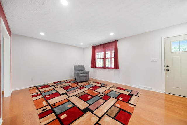 5770 Linworth Rd, Columbus, OH 43235 - entrance foyer featuring recessed lighting, wood finished floors, and baseboards