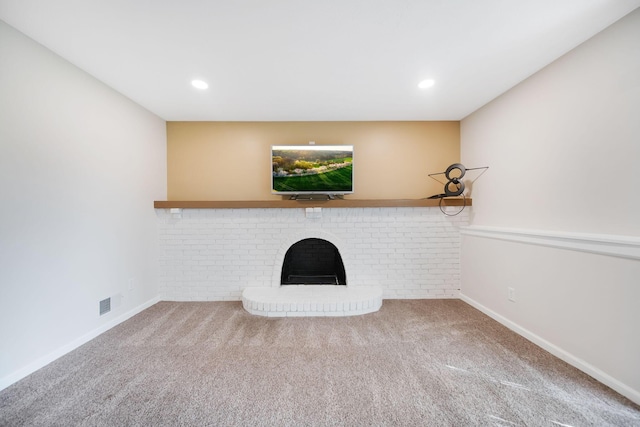 5770 Linworth Rd, Columbus, OH 43235 - unfurnished living room featuring carpet flooring, a brick fireplace, baseboards, and recessed lighting