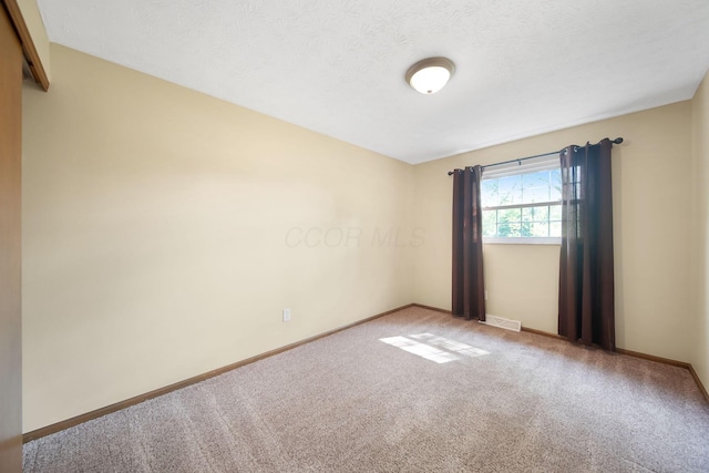 5770 Linworth Rd, Columbus, OH 43235 - carpeted empty room with baseboards