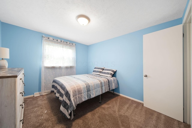 5770 Linworth Rd, Columbus, OH 43235 - bedroom featuring carpet flooring, baseboards, and a textured ceiling