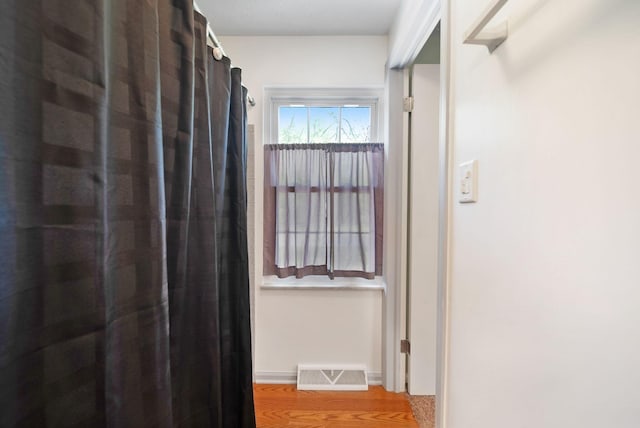 5770 Linworth Rd, Columbus, OH 43235 - hallway featuring wood finished floors and baseboards