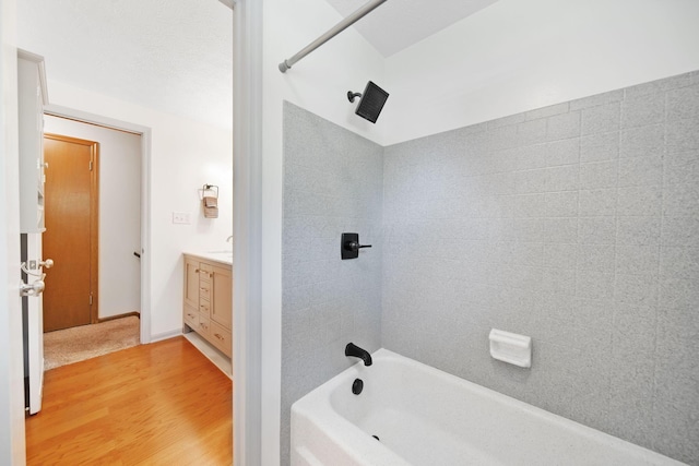 5770 Linworth Rd, Columbus, OH 43235 - bathroom with shower / tub combination, vanity, and wood finished floors