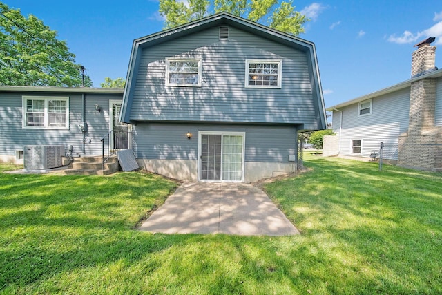 5770 Linworth Rd, Columbus, OH 43235 - back of house with a patio area, a lawn, and central AC unit
