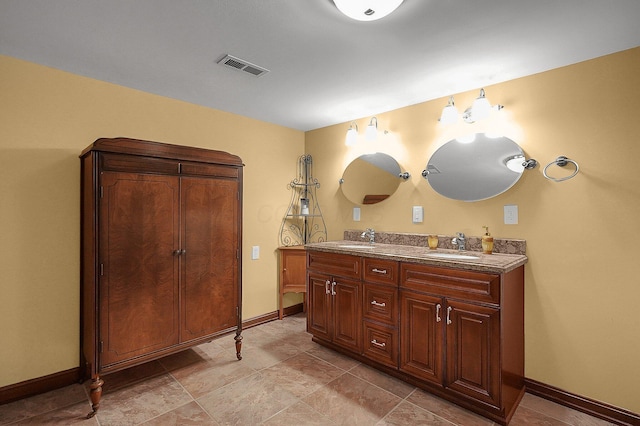 1059 Circle On The Grn, Columbus, OH 43235 - full bathroom with double vanity and baseboards