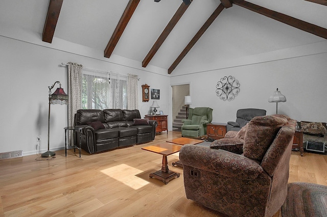 1059 Circle On The Grn, Columbus, OH 43235 - living room with high vaulted ceiling, beam ceiling, and light wood-style floors