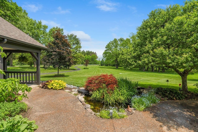 3515 Babbitt Rd, Blacklick, OH 43004 - view of grassy yard with a garden pond and a gazebo