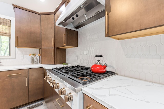3515 Babbitt Rd, Blacklick, OH 43004 - kitchen featuring range, custom exhaust hood, tasteful backsplash, and light stone counters