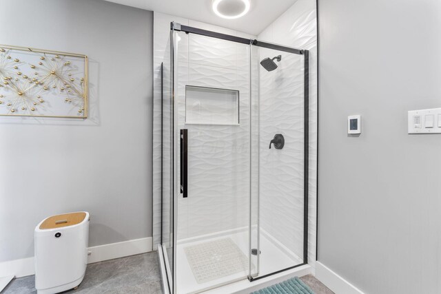 3515 Babbitt Rd, Blacklick, OH 43004 - bathroom featuring baseboards and a stall shower