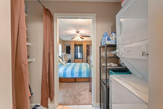 3009 Hiawatha St, Columbus, OH 43224 - washroom with stacked washing machine and dryer and a ceiling fan
