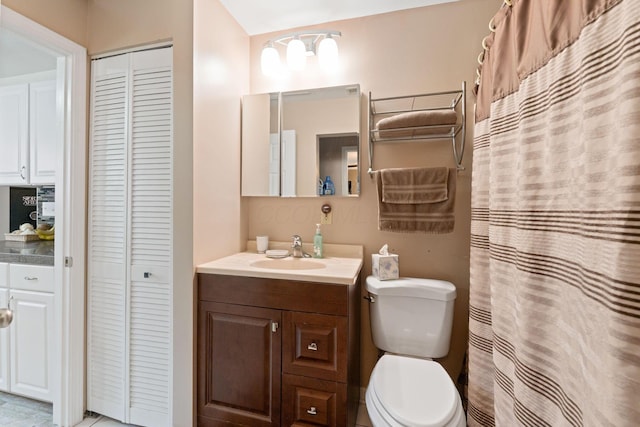 3009 Hiawatha St, Columbus, OH 43224 - full bathroom with a closet, vanity, and toilet