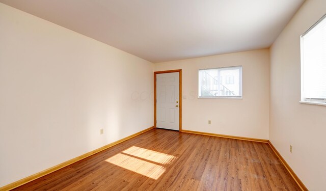 1088 Franklin Ave, Columbus, OH 43205 - unfurnished room featuring wood finished floors and baseboards
