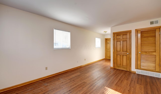 1088 Franklin Ave, Columbus, OH 43205 - empty room with wood finished floors and baseboards
