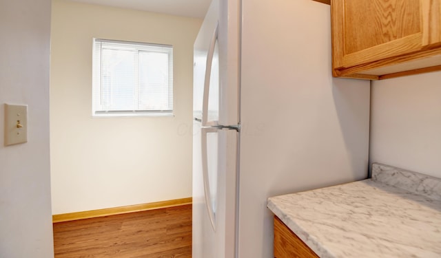 1088 Franklin Ave, Columbus, OH 43205 - bathroom with wood finished floors and baseboards