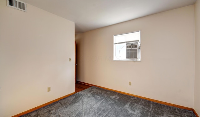 1088 Franklin Ave, Columbus, OH 43205 - unfurnished room featuring dark carpet and baseboards