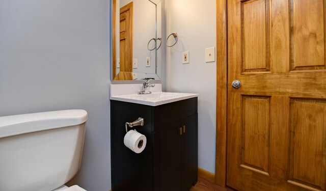 1088 Franklin Ave, Columbus, OH 43205 - half bathroom featuring toilet and vanity