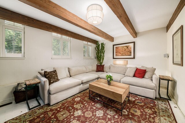 584 Franklin Ave, Columbus, OH 43215 - living room featuring beamed ceiling and baseboards
