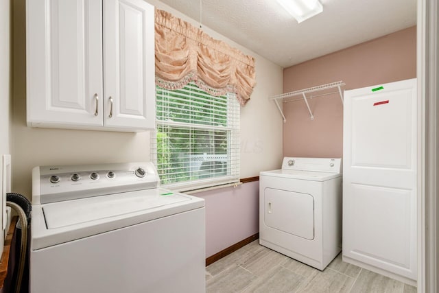 13582 Capetown Ave, Pickerington, OH 43147 - laundry room with washing machine and clothes dryer and cabinet space