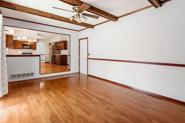13582 Capetown Ave, Pickerington, OH 43147 - unfurnished living room with light wood finished floors, a ceiling fan, beamed ceiling, and a chandelier