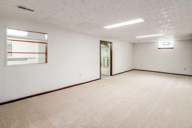 13582 Capetown Ave, Pickerington, OH 43147 - carpeted empty room featuring a textured ceiling and baseboards