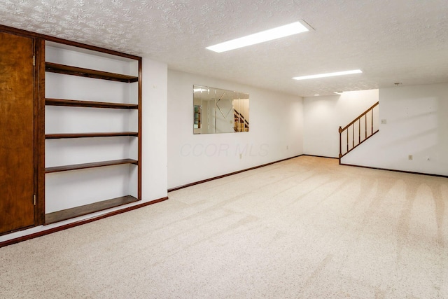 13582 Capetown Ave, Pickerington, OH 43147 - carpeted empty room featuring a textured ceiling and stairs