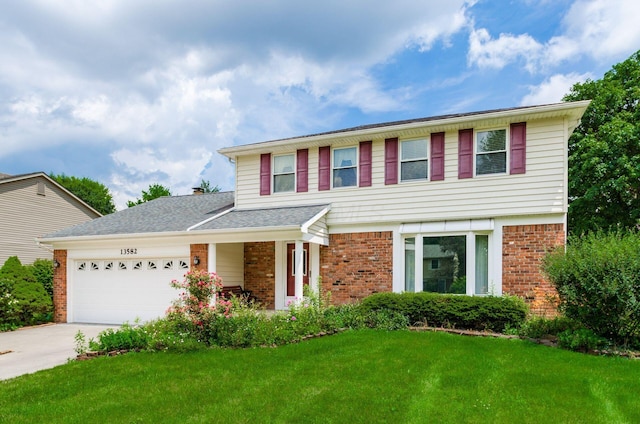 13582 Capetown Ave, Pickerington, OH 43147 - view of front of house featuring brick siding, a garage, a front lawn, and concrete driveway